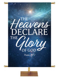 The Heavens Declare The Glory of God Psalm 19:1. Star-filled night sky with brightly shining star in the distance and white and light blue lettering