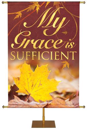 My Grace Is Sufficient in the look of gold foil on Banner for Fall and Thanksgiving with yellow leaf falling to forest floor