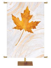Custom Banner Echoes of Autumn with Single Gold Maple leaf on background of hues of bronze and copper