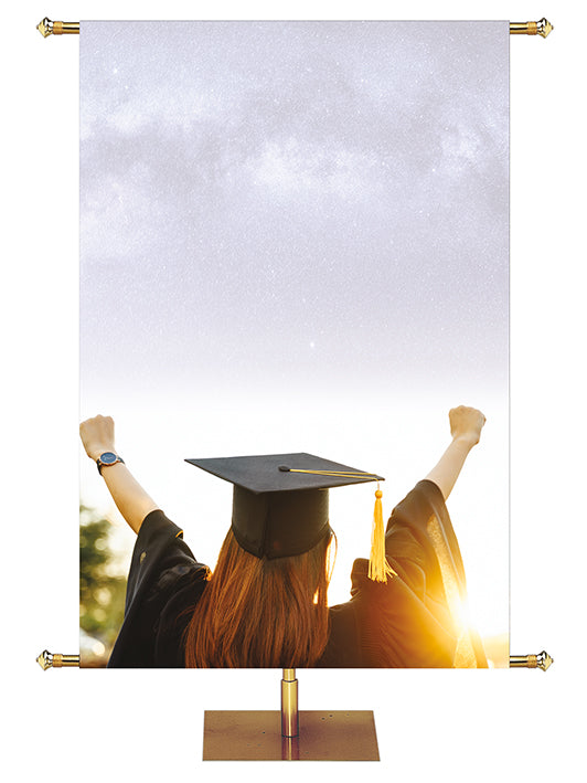 Graduate in Cap and Gown with Upstretched Arms Graduation Banner