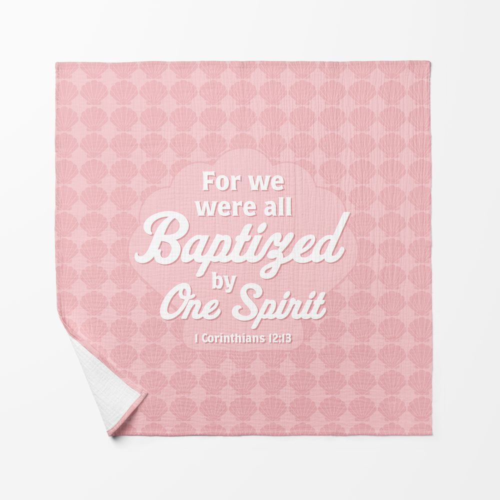 Baby Swaddle Faith Blanket with For We Were All Baptized by One Spirit 1 Corinthians 12:13 in White letters on Pink background with shell symbols 
