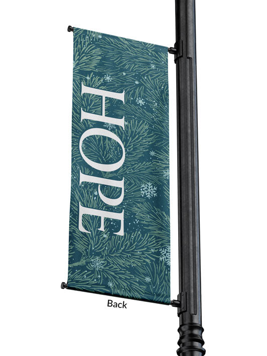 Outdoor Light Pole Banner Hope in White letters on Blue background of Evergreen branches