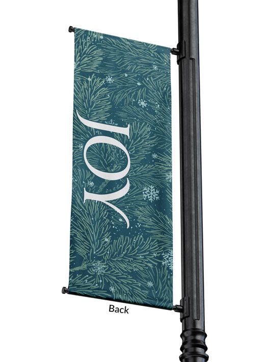 Outdoor Light Pole Banner Joy in White letters on Blue background of Evergreen branches