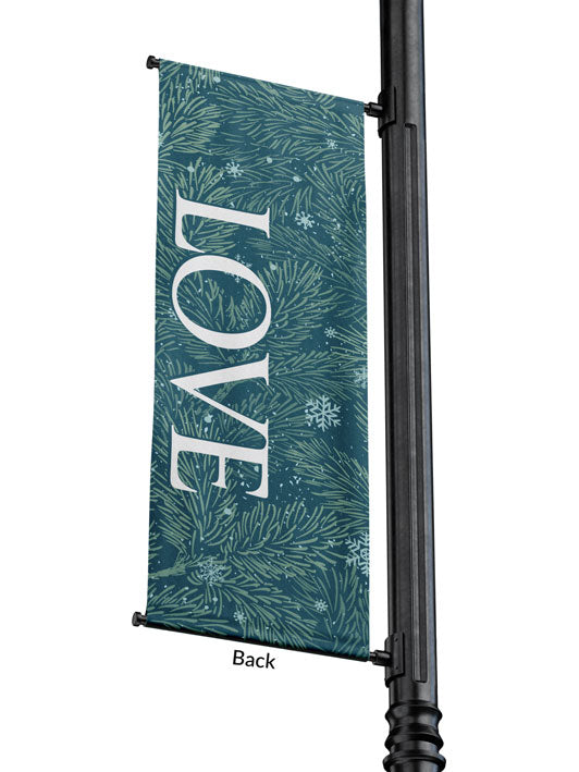 Outdoor Light Pole Banner Love in White letters on Blue background of Evergreen branches