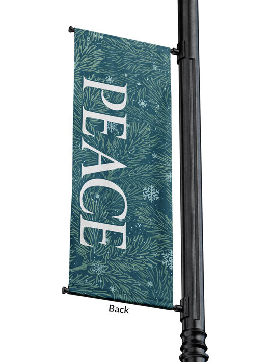 Outdoor Light Pole Banner Peace in White letters on Blue background of Evergreen branches