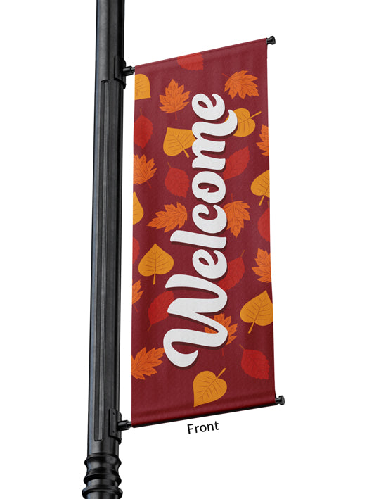Light Pole Banner Welcome in White with Gold, Orange and Red Autumn Leaves on Banner of Red