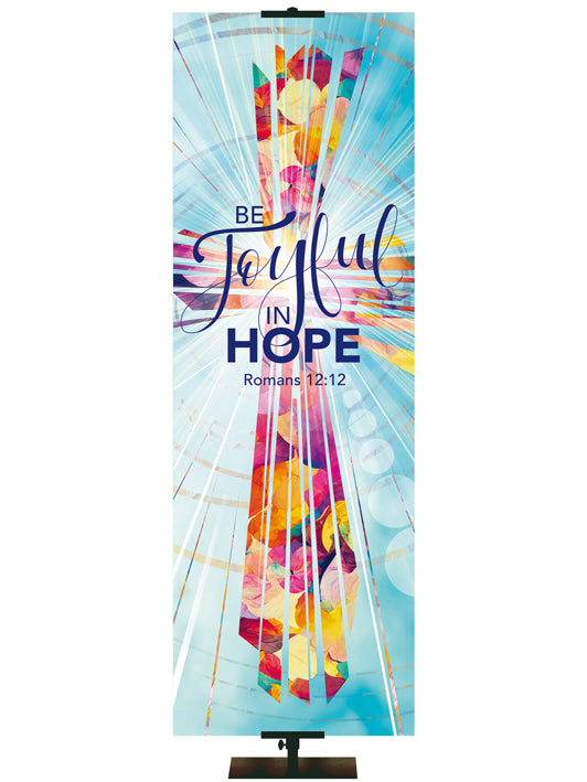 Be Joyful In Hope. Romans 12:12. Radiant Cross Design (right format) in Multicolor on Light Blue