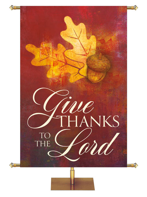 Church Banner Brush Strokes of Autumn Give Thanks To The Lord painted style left leaves and acorns on red background