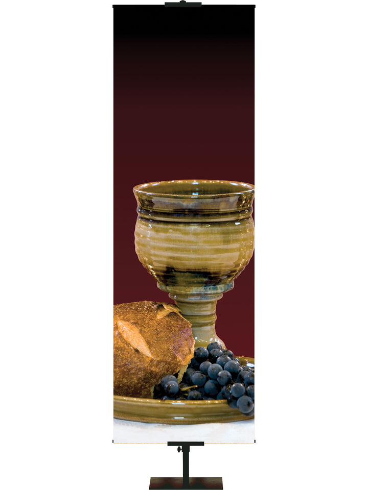 Custom Church Banner Background with a bunch of grapes draping over a plate holding a brown and cream wine chalice with broken bread (right) thin format