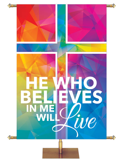 Hues of Grace He Who Believes Church Banner for Easter with Magnificent multicolored Cross Symbol right side wide format