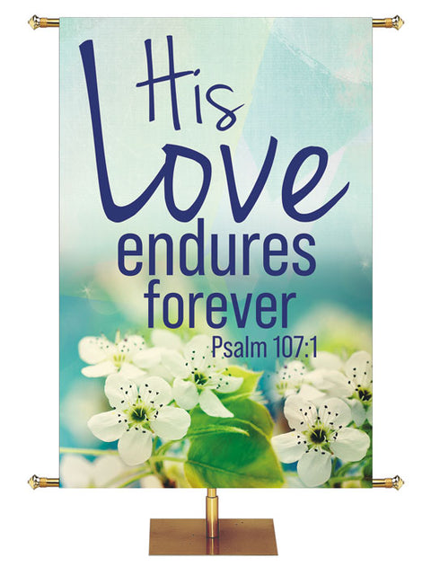 His Love Endures Forever Psalm 107:1 Church Banner with Snow White Flowers with Green Leaves on Pastel