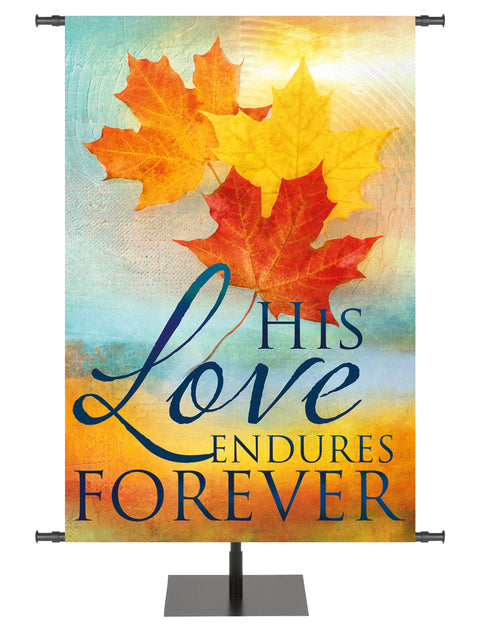 A Joyous Autumn Banner His Love Endures with gold, yellow, and orange Maple Leaves on watercolor background
