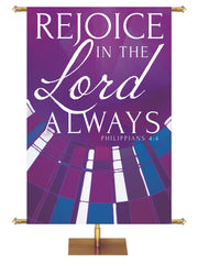 Church Banner Streaming Light Rejoice In The Lord Always. Philippians 4:4. In Blue, Green, Purple and Red.