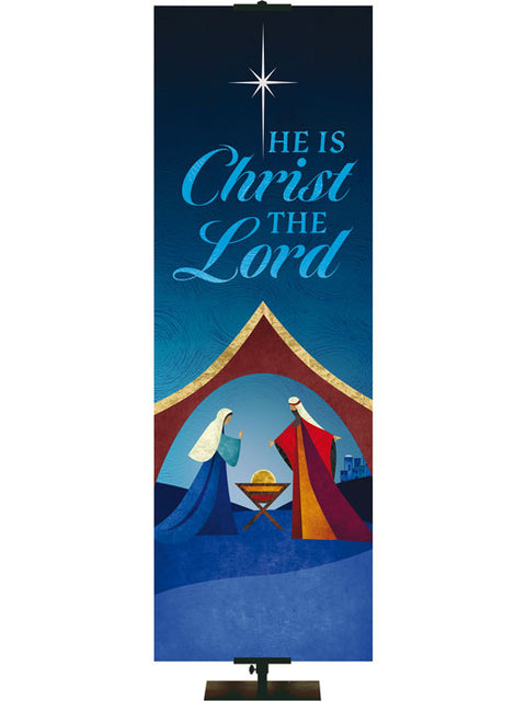 Christmas Banner for Church. Scenes of Christmas. He is Christ the Lord. Silhouette of the Manger scene in blue, gold and orange.