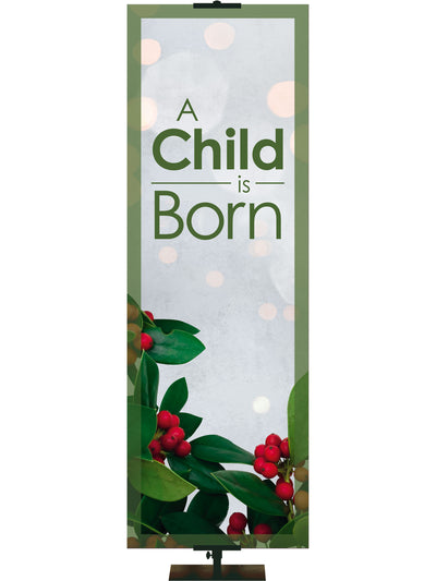 A Child is Born Christmas Banner with red and green holly on whimsical blue Banner with green border