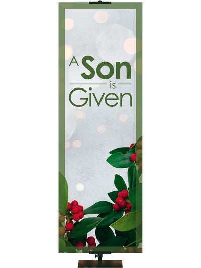 A Son is Given Christmas Banner with red and green holly on fanciful blue Banner with green border